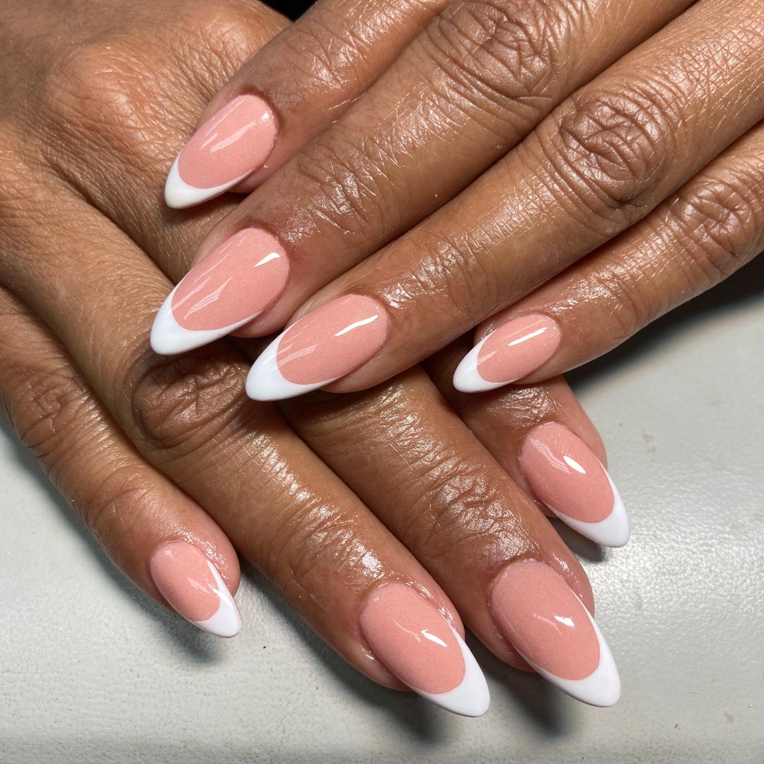 A French-tip nail set done at the salon